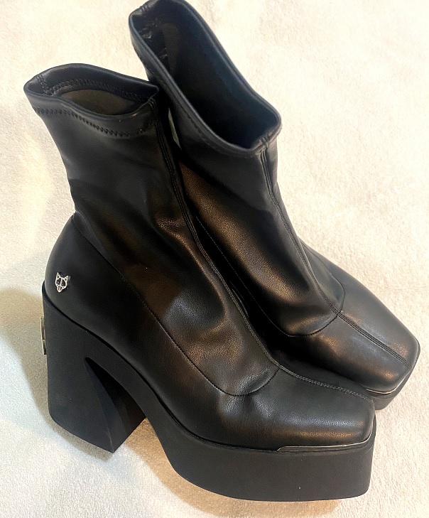 Step Up Your Style Game with Women's Chunky Sole Black Leather Boots by Naked Wolfe - Size 8
